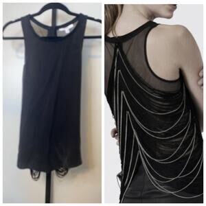 Zero sleeve blouse by Chelsea and Walker